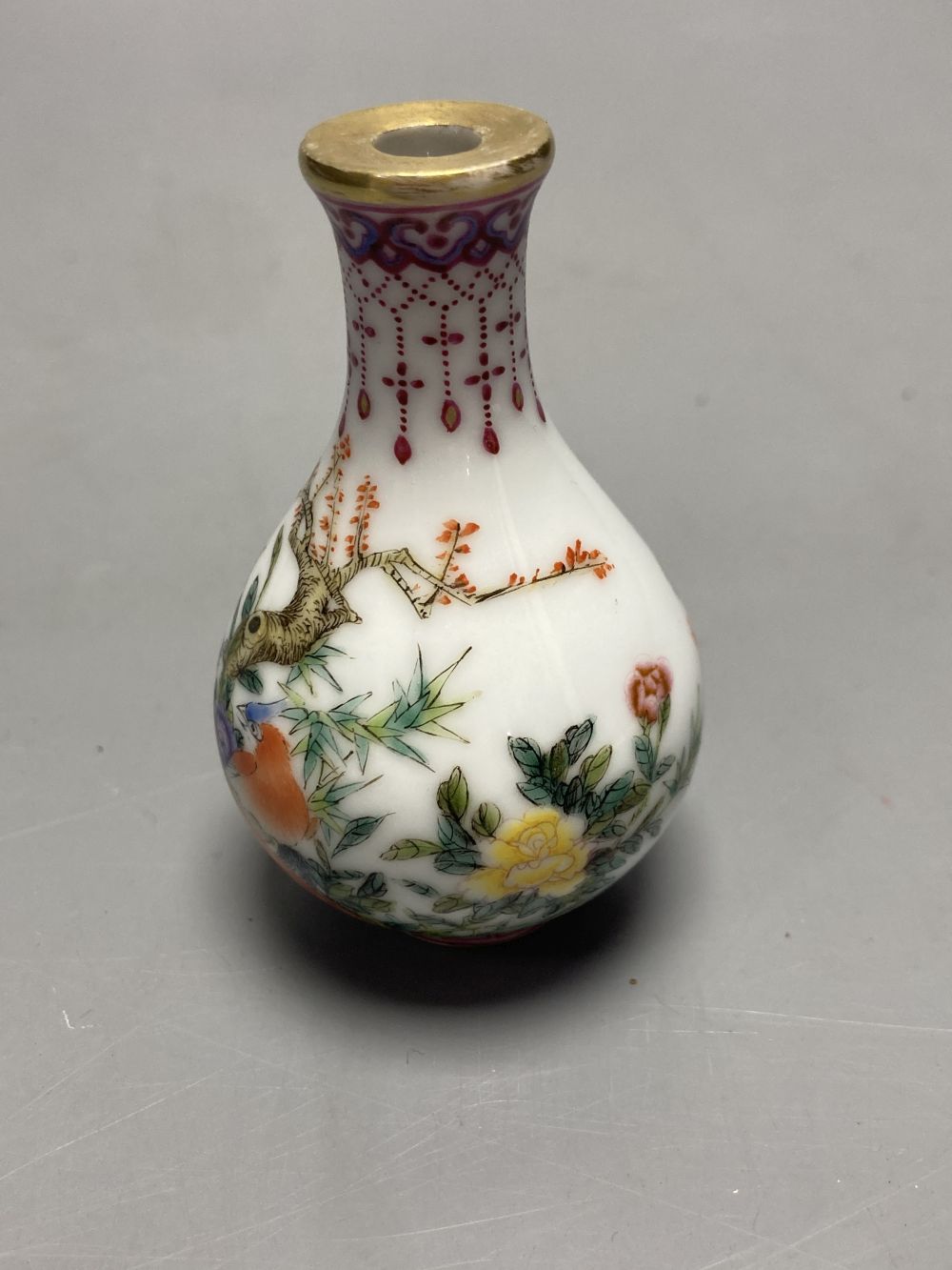 A Chinese famille rose snuff bottle, Republic or later, height 8cm